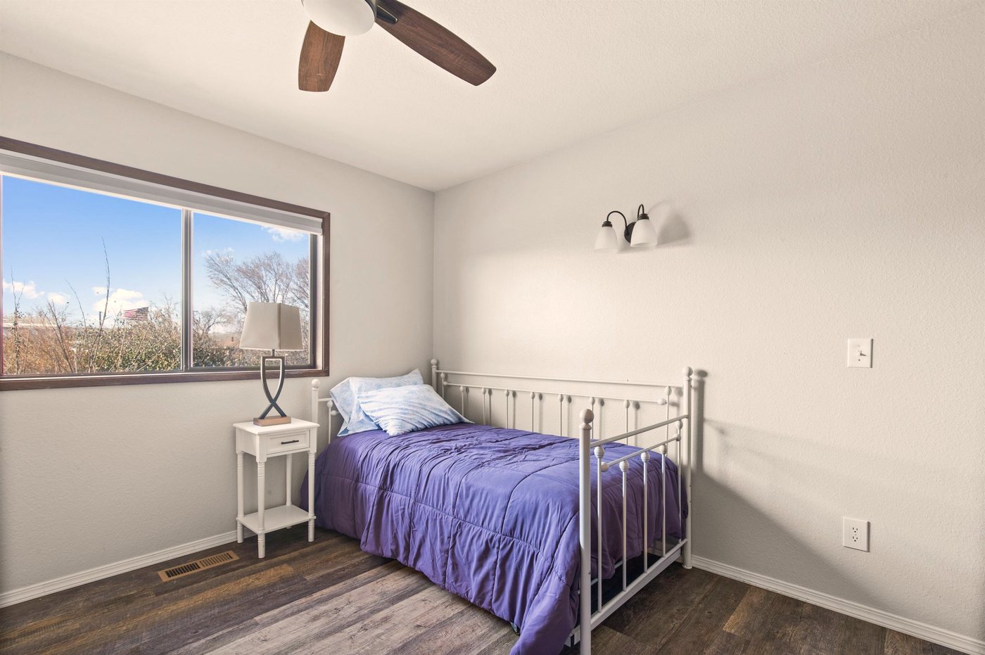 A comfortable resident bedroom ready for a complimentary stay